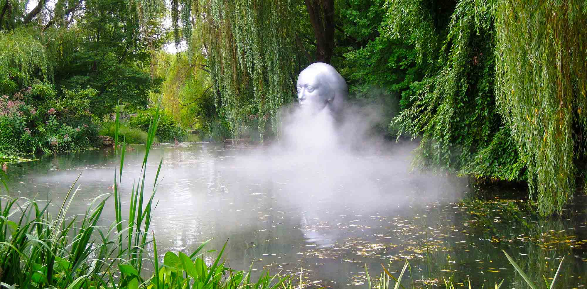 Mystical Outdoor Head Sculpture in Pond with Fog at Grounds For Sculpture - Why Central Jersey?